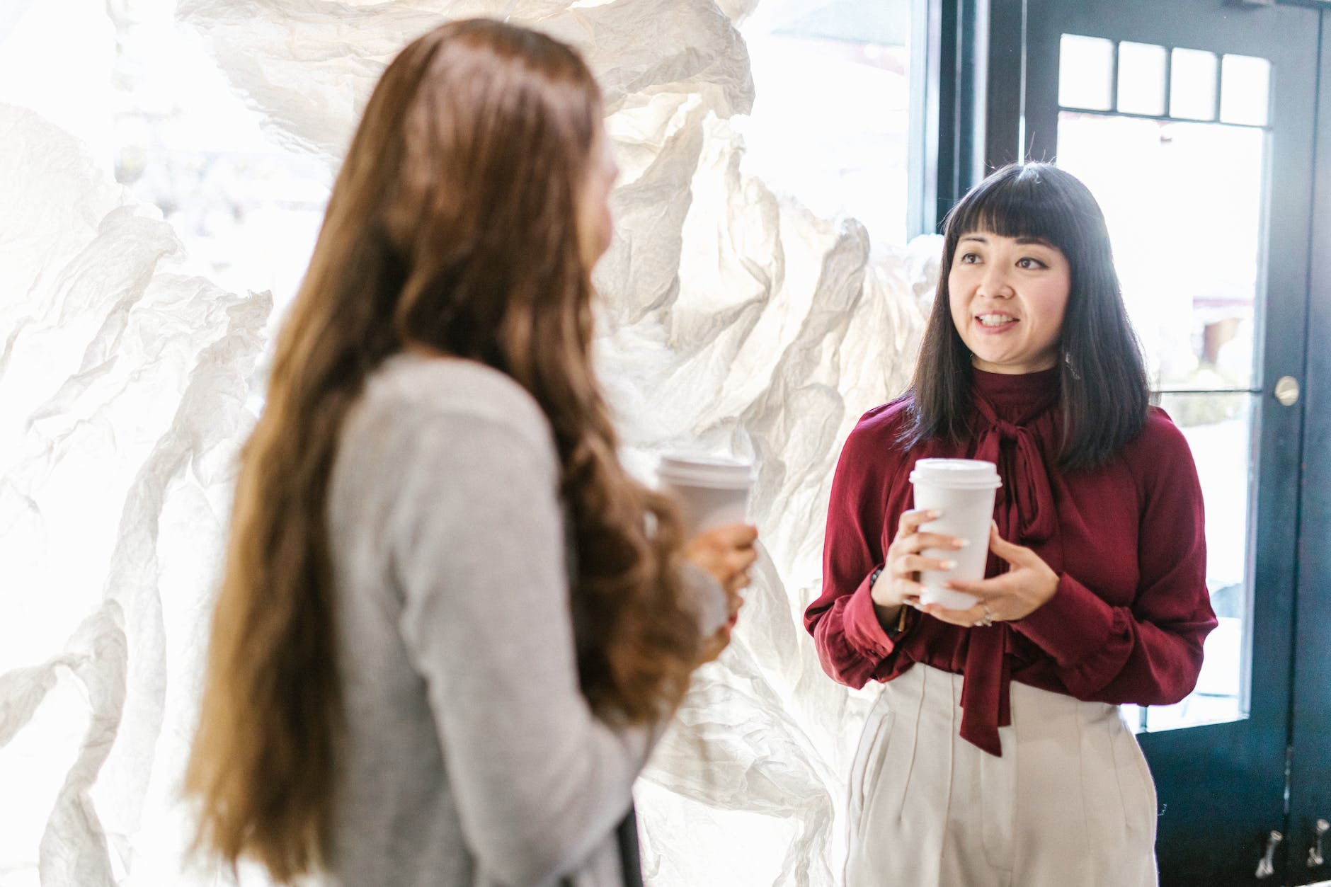 women chatting during an office break