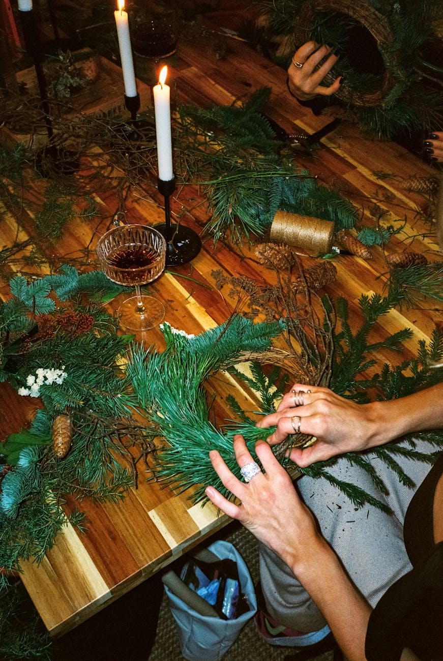 close up shot of a person making a christmas decorations