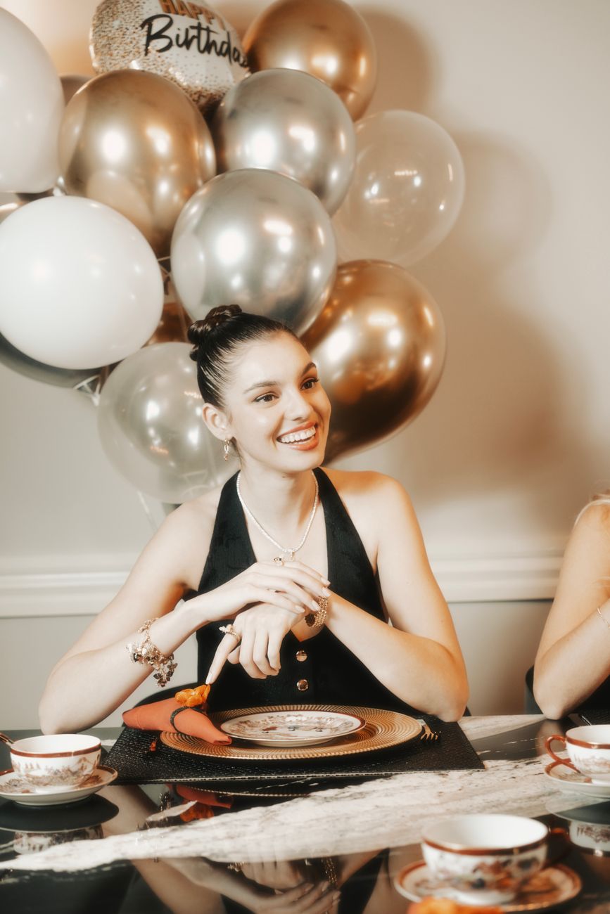 woman eating meal on a birthday party