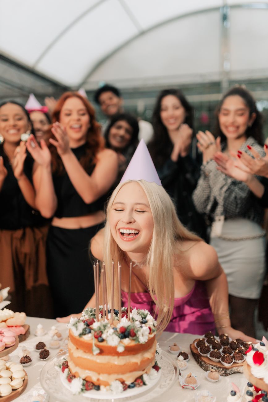 joyful birthday celebration with friends photo by alexander mass